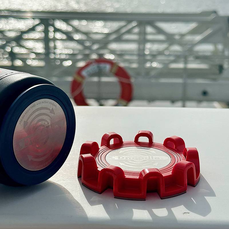 Dnoodle system mounted on a boat gunnel with a Key Plate attached to an insulated cooler.
